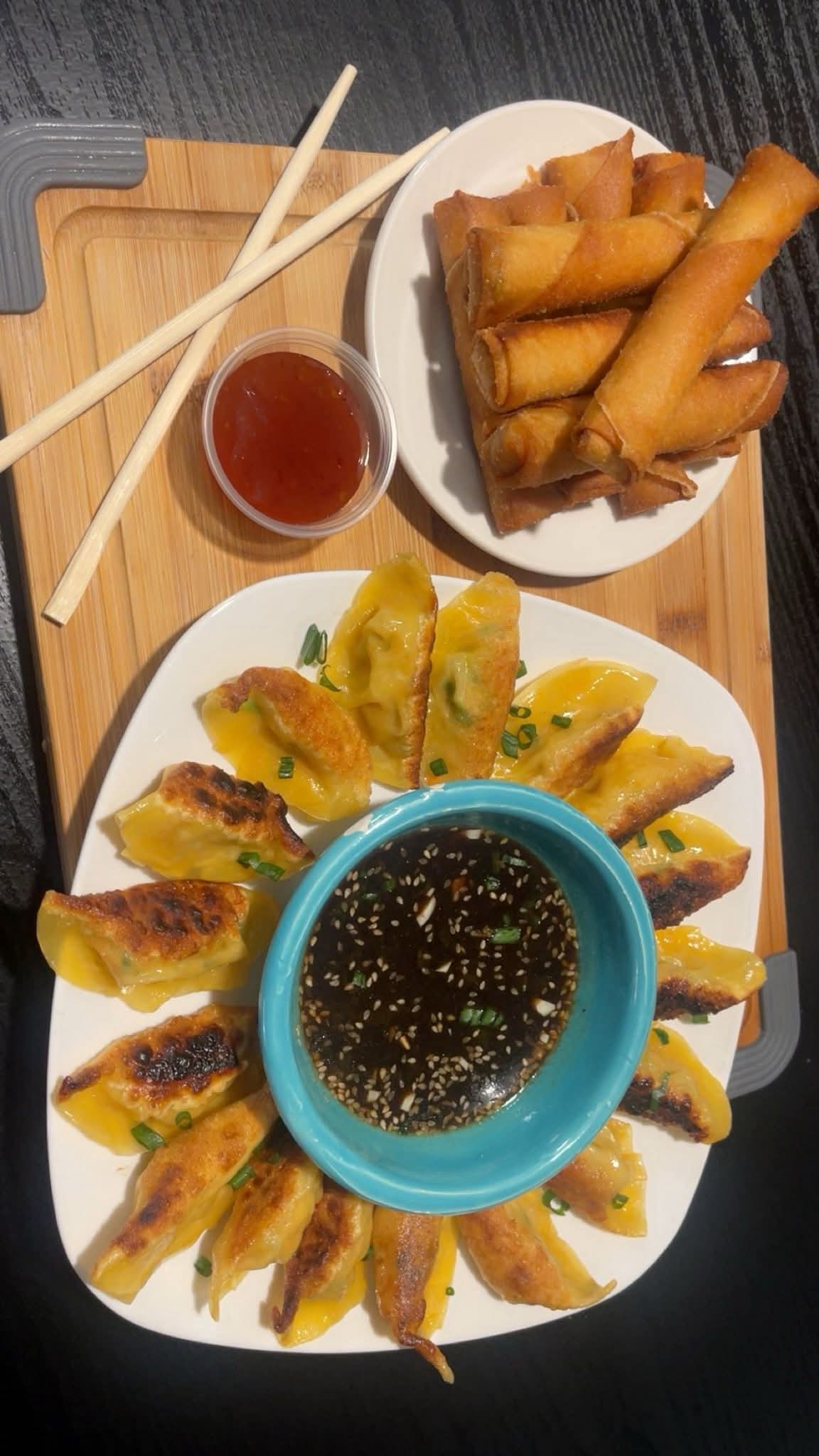 ANUME signature dumplings and crispy gold eggrolls with dipping sauces